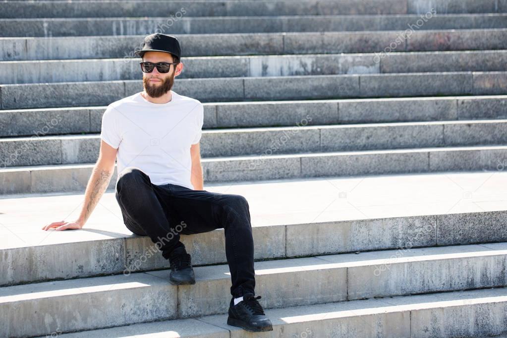 Hipster handsome male model with beard  wearing white blank  t-s