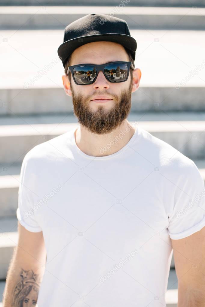 Hipster handsome male model with beard  wearing white blank  t-s