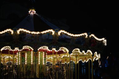 Carousel vintage at night outdoors at carnival