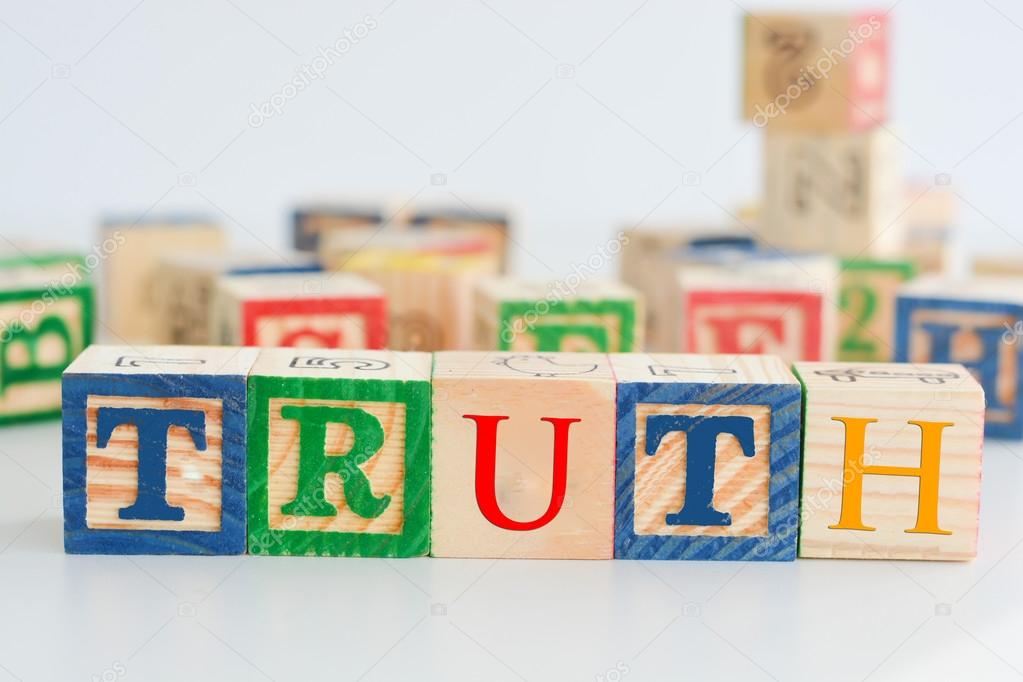 truth lettering on puzzle blocks 