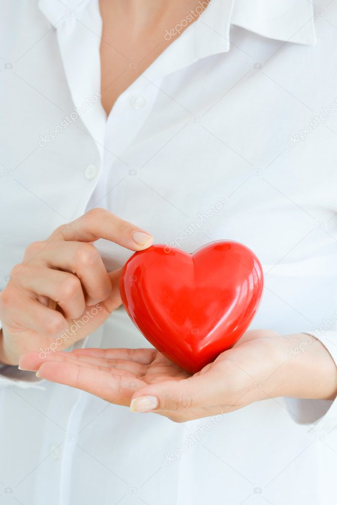 female hands holding heart mockup