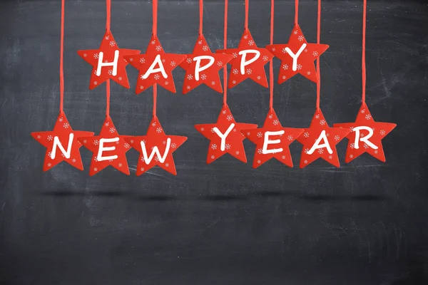 Šťastný nový rok přání s rudou hvězdou na tabuli pozadí, samostatný — Stock fotografie