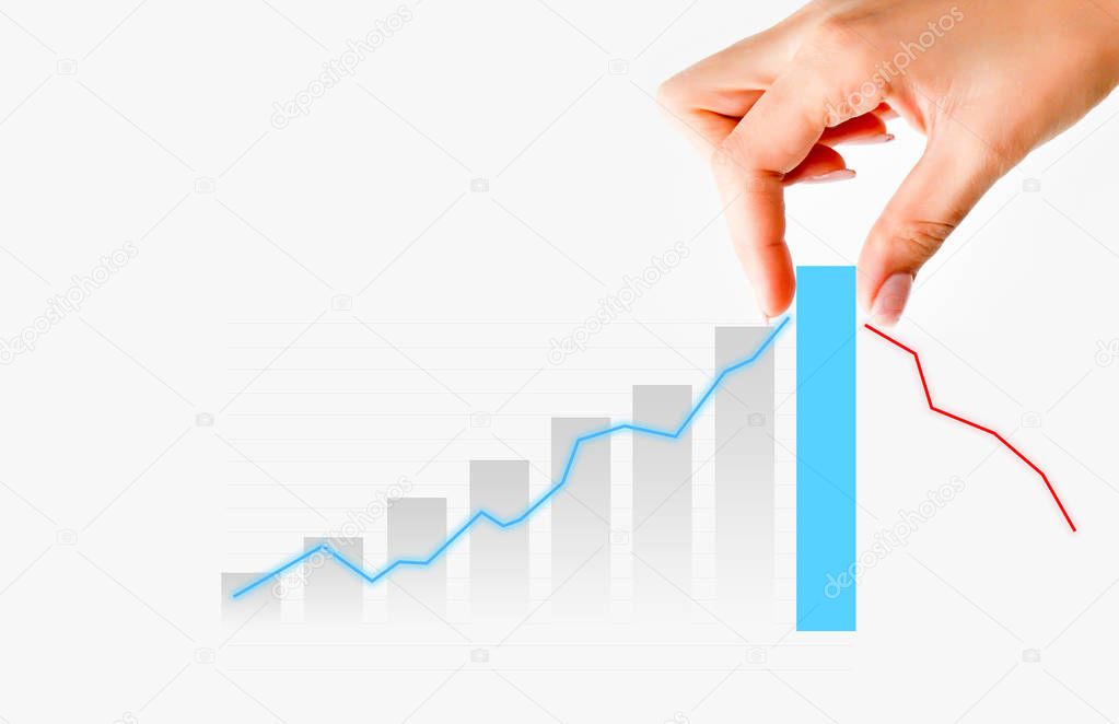 Human hand pulling graph bar suggesting increase of sales or business