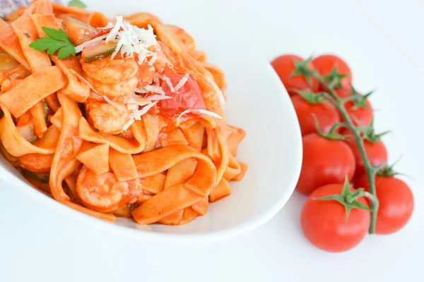 Shrimp tagliatelle with tomato sauce — Stock Photo, Image