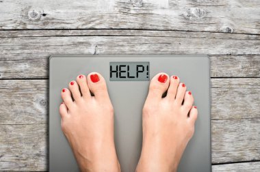 Bir ağırlık ölçekte adım kadın ayaklı kilogram kaybetmek yardım