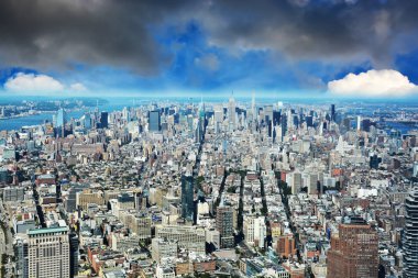 New York City skyline with beautiful clouds and blue sky clipart