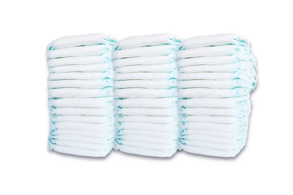 Pile or stack of baby diapers isolated on white background — Stock Photo, Image
