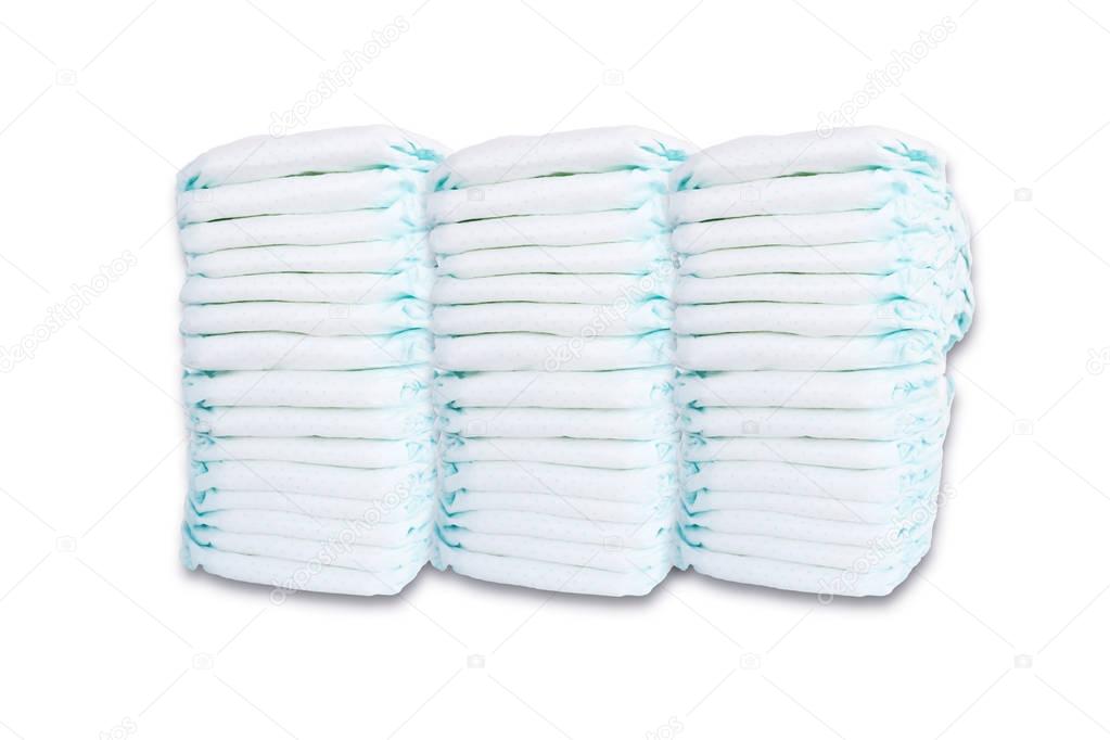 Pile or stack of baby diapers isolated on white background