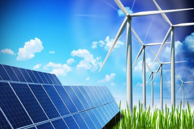 Yenilenebilir enerji güneş panelleri ve rüzgar türbinleri yeşil alan üzerinde konseptiyle