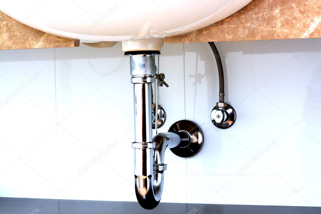 Basin siphon or sink drain in a bathroom