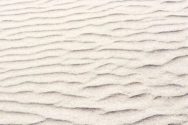 Sfondo o texture di onde di sabbia di colore chiaro senza cuciture — Foto Stock