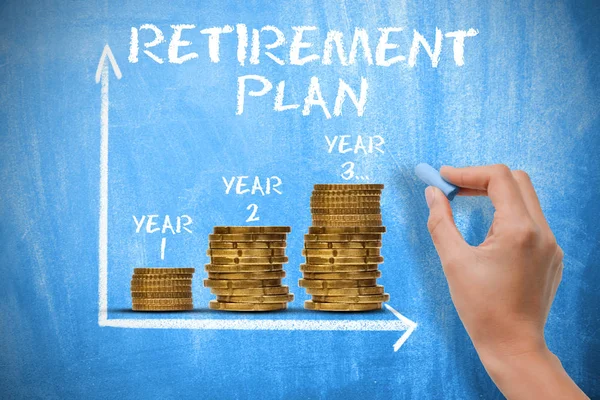 Retirement plan concept with piles of coins on blue chalkboard — Stock Photo, Image