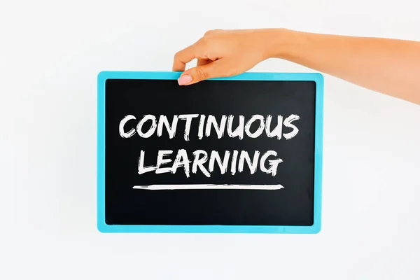 Continuous Learning  text handwritten on chalkboard — Stock Photo, Image