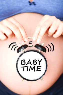 Its time to have a baby with pregnant belly and classic alarm clock spelling baby time clipart