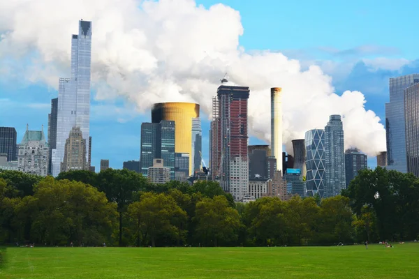 Pollution problems in urban area  New York City landscape with emissions in background