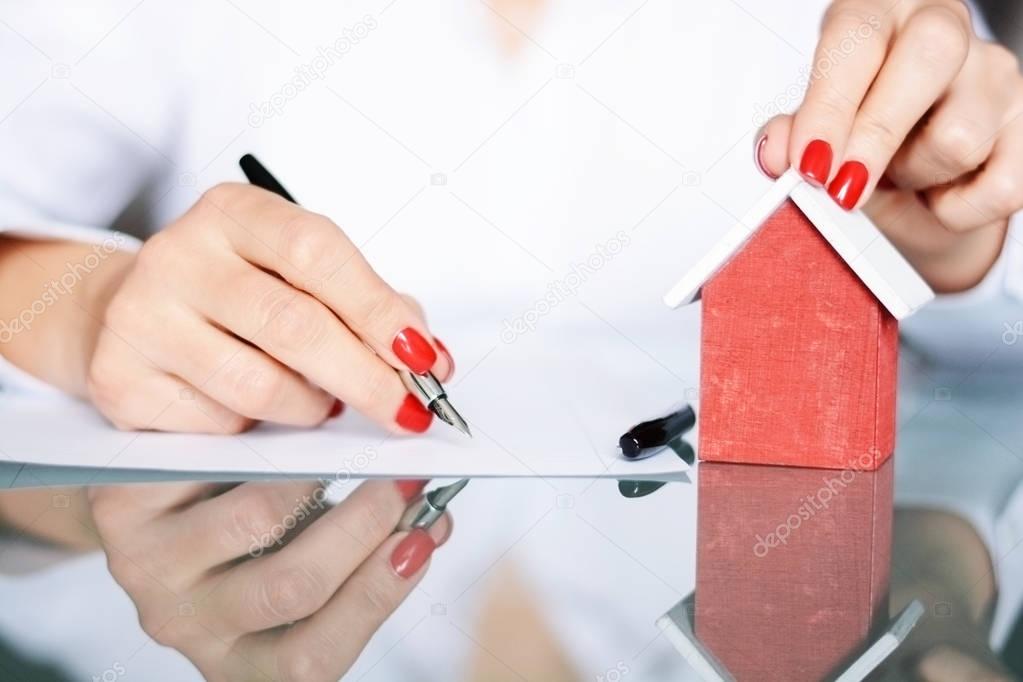 Contract signing of a new house, real estate concept