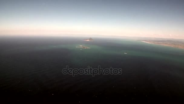 Landscape of green mountain and ocean coast view from helicopter in New Zealand. — Stock Video