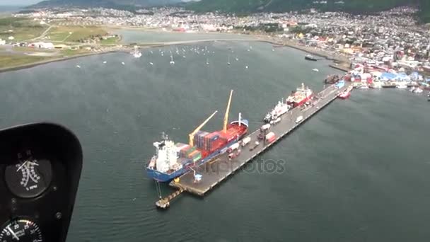 Port of Ushuaia view from the top of the helicopter window . — Stok Video