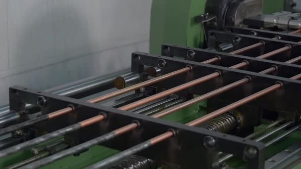 Manufacture of metal tubes on industrial CNC machine in factory slow motion. — Stock Video