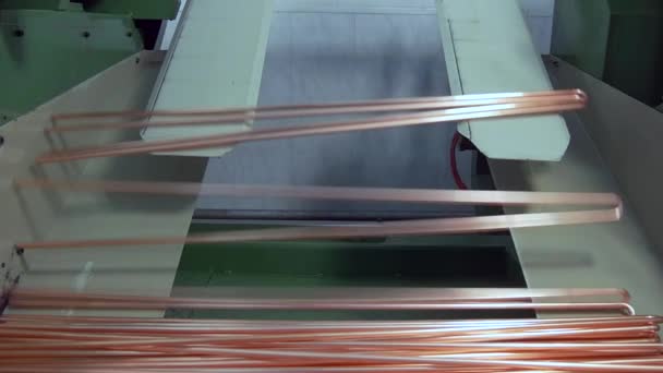 Manufacture of metal tubes on industrial CNC machine slow motion. — Stock Footage Manufacture of metal tubes on industrial CNC machine slow motion. Video Clip
