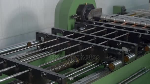 Manufacture of metal tubes on industrial CNC machine in factory slow motion. — Stock Video