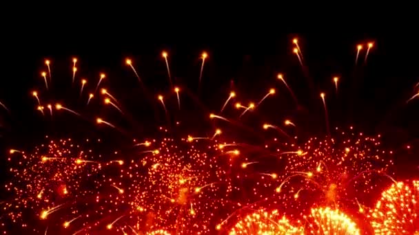 Firework display at night on black background. — Stock Video