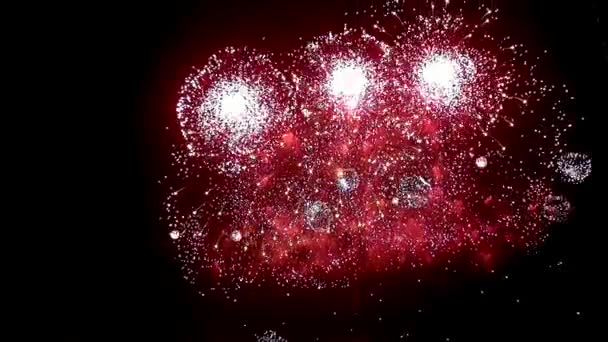 Világos piros zöld sárga robbanások tűzijáték jeleníti meg a fekete háttér. — Stock videók