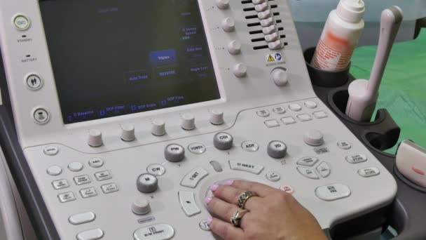 Hand of woman and ultrasound examination medical equipment. — Stock Footage Hand of woman and ultrasound examination medical equipment. Stock Video