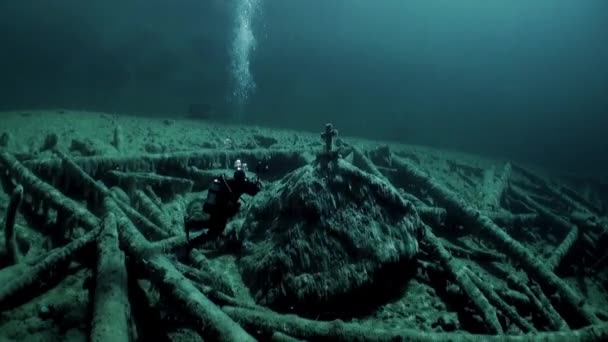 Scuba diving in Fernsteinsee mountain lake underwater Tyrol Austria. — Stock Video