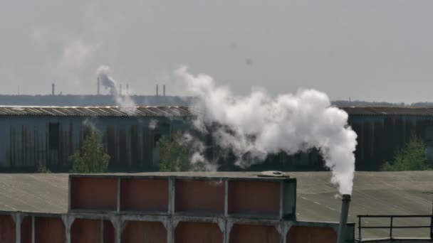 Industrial pipes of plant chimney smoke. — Stock Video