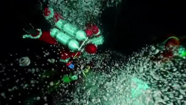 Underwater New Year and divers in Christmas costumes with Santa Claus. — Stock Video