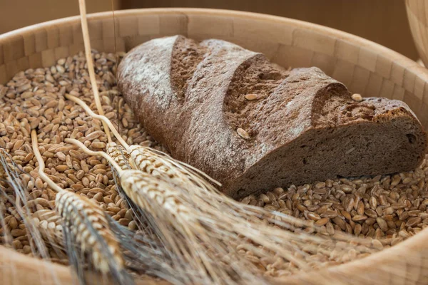 Bowl of Wheat Grains, Flour and Bread