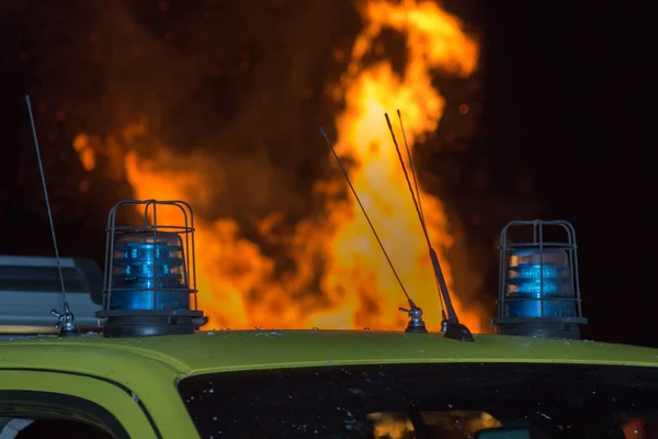 Detail of Flashing Blue Siren Light on Roof of Emergency Vehicle