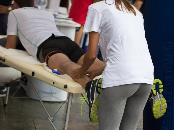 Athlete\'s Calf Muscles Massage after Sport Workout