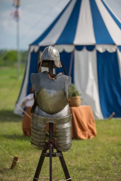 Medieval Metallic Armor and Ancient Tent in background — Stock Photo, Image