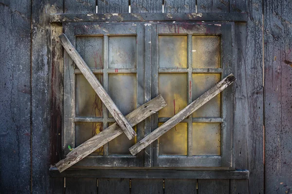 Closed Wooden Window Barred with Wooden Planks — Stock Photo, Image