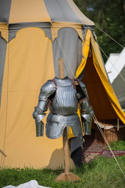 Medieval Metallic Armor and Ancient Tent in background — Stock Photo, Image