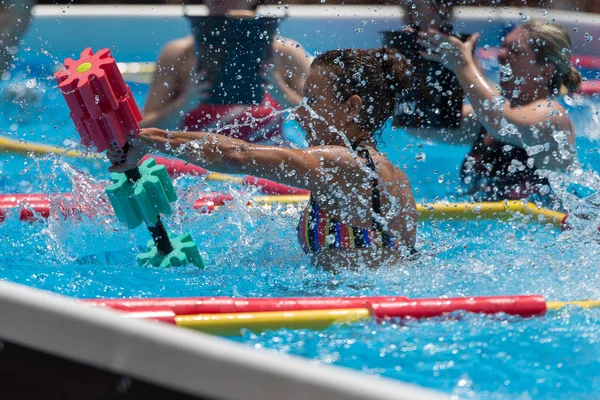 Girls Doing Water Aerobics with Floating Pool Dumbbells Outdoor in a Swimming Pool — Stock Photo, Image