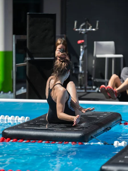 Girl Doing Exercises Floating Fitness Mat Outdoor Swimming Pool Stock Editorial Photo giorgiorossi73 354449114