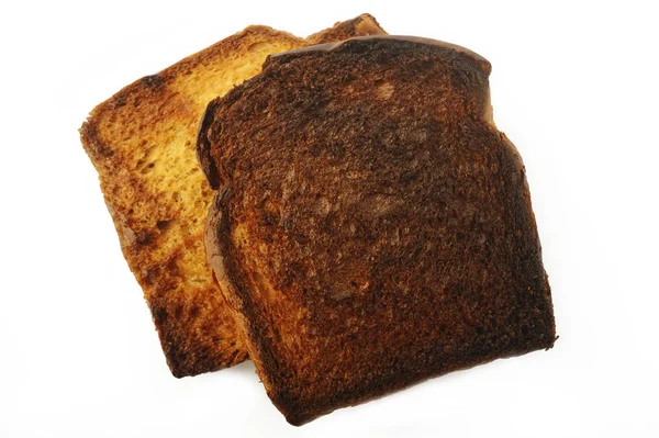 Beyaz arka plan üzerinde izole yanmış tost