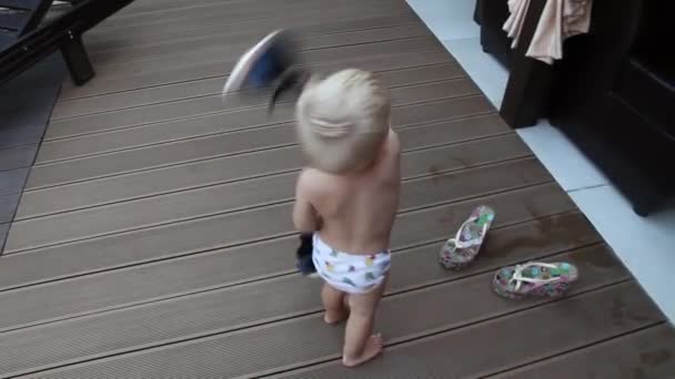 Portrait of a little boy who indulges, plays, enjoys life — Stock Video