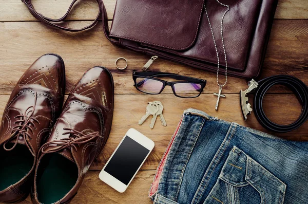 accessory for men, placed on a wooden floor.