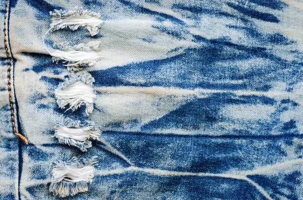 Wrinkles blue jeans texture. Jeans background. — Stock Photo, Image