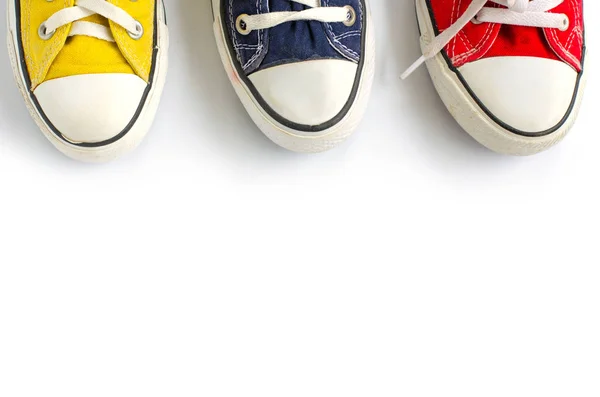 Multicolored sneakers on white background — Stock Photo, Image