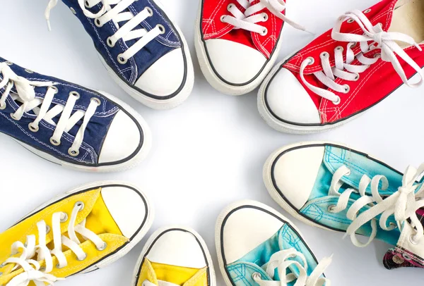 Multicolored sneakers on white background — Stock Photo, Image