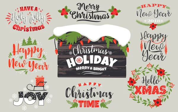 Set di Natale e felice anno nuovo lettering disegni in colori tradizionali . — Vettoriale Stock