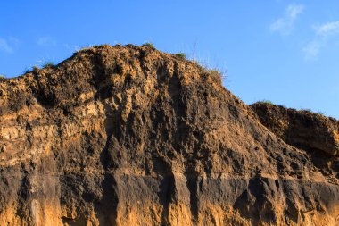 Cliff, rock rock doku, mavi gökyüzü ile