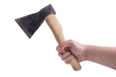 Mans hand holds an old metal ax with a wooden hatchet on a white background clipart