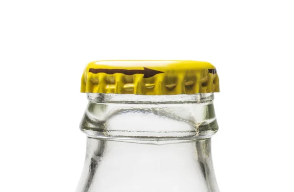 Neck of glass bottle from soda water with yellow metal stopper on white background — Stock Photo, Image