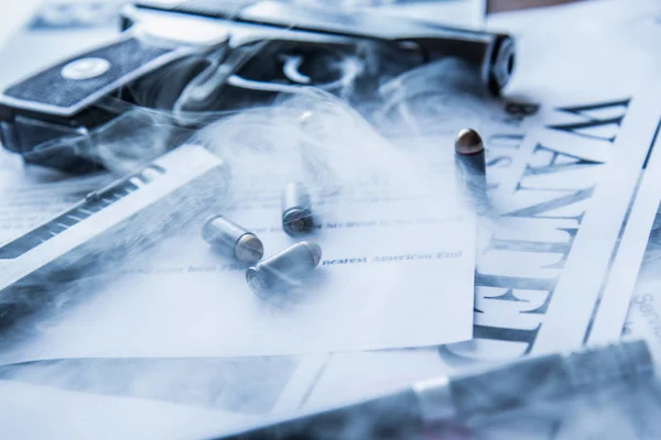 An announcement about the search for a criminal on the table of the bounty hunter, a combat pistol, cartridges — Stock Photo, Image